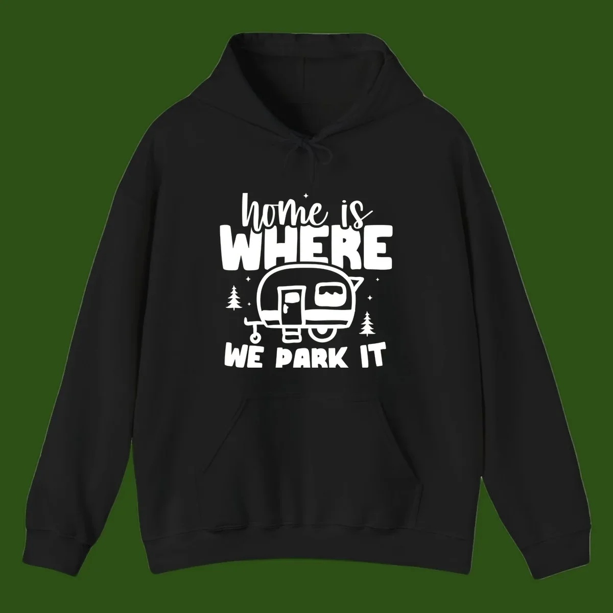Retro-style design with 'home is where we park it' text and vintage travel trailer illustration surrounded by pine trees and sparkles