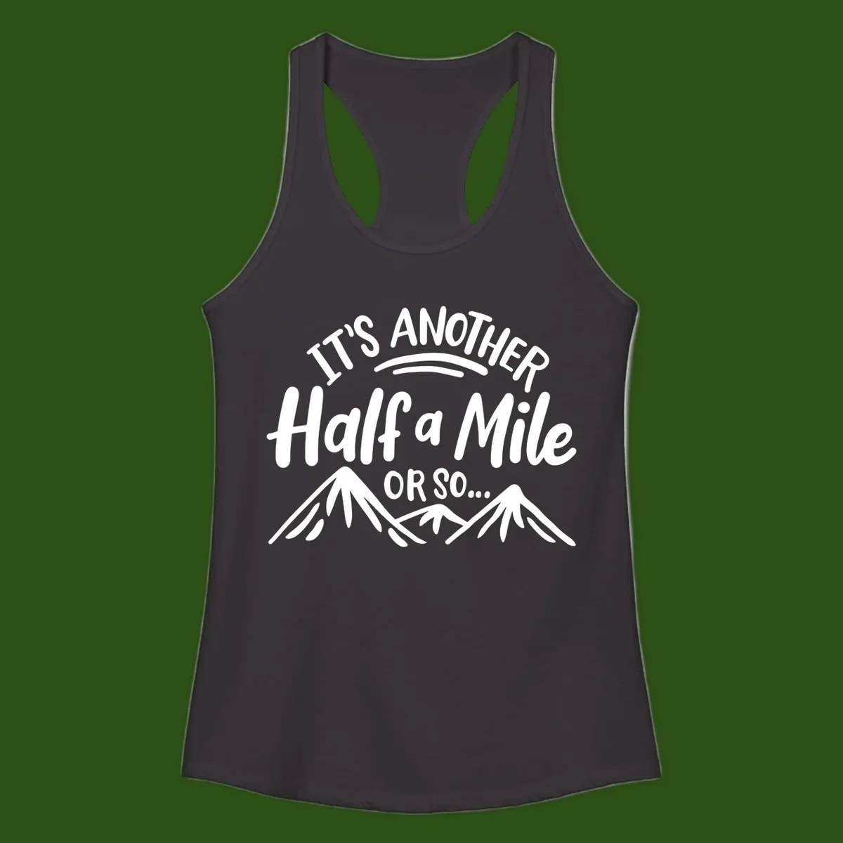 White text reading 'It's Another Half a Mile Or So...' with illustrated snow-capped mountains below on gray background