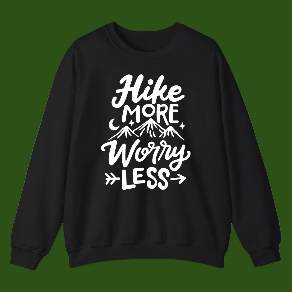 White lettered design reading 'Hike More Worry Less' with mountain peaks, moon, and stars on gray background