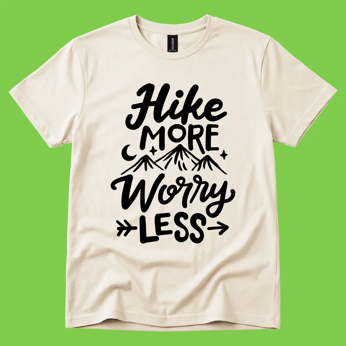 White lettered design reading 'Hike More Worry Less' with mountain peaks, moon, and stars on gray background
