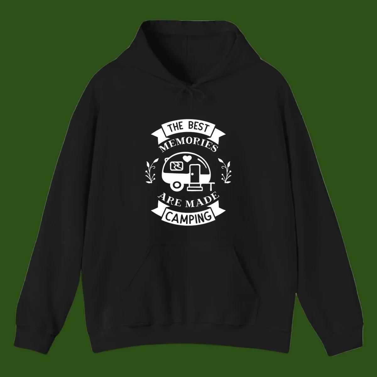 Vintage badge design with travel trailer and heart, text reading 'The Best Memories Are Made Camping' with decorative botanical branches