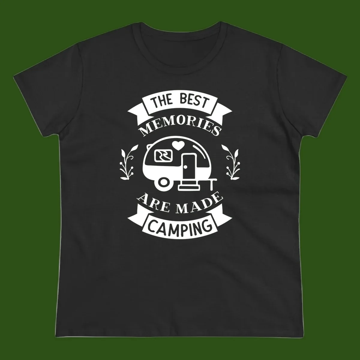 Vintage badge design with travel trailer and heart, text reading 'The Best Memories Are Made Camping' with decorative botanical branches