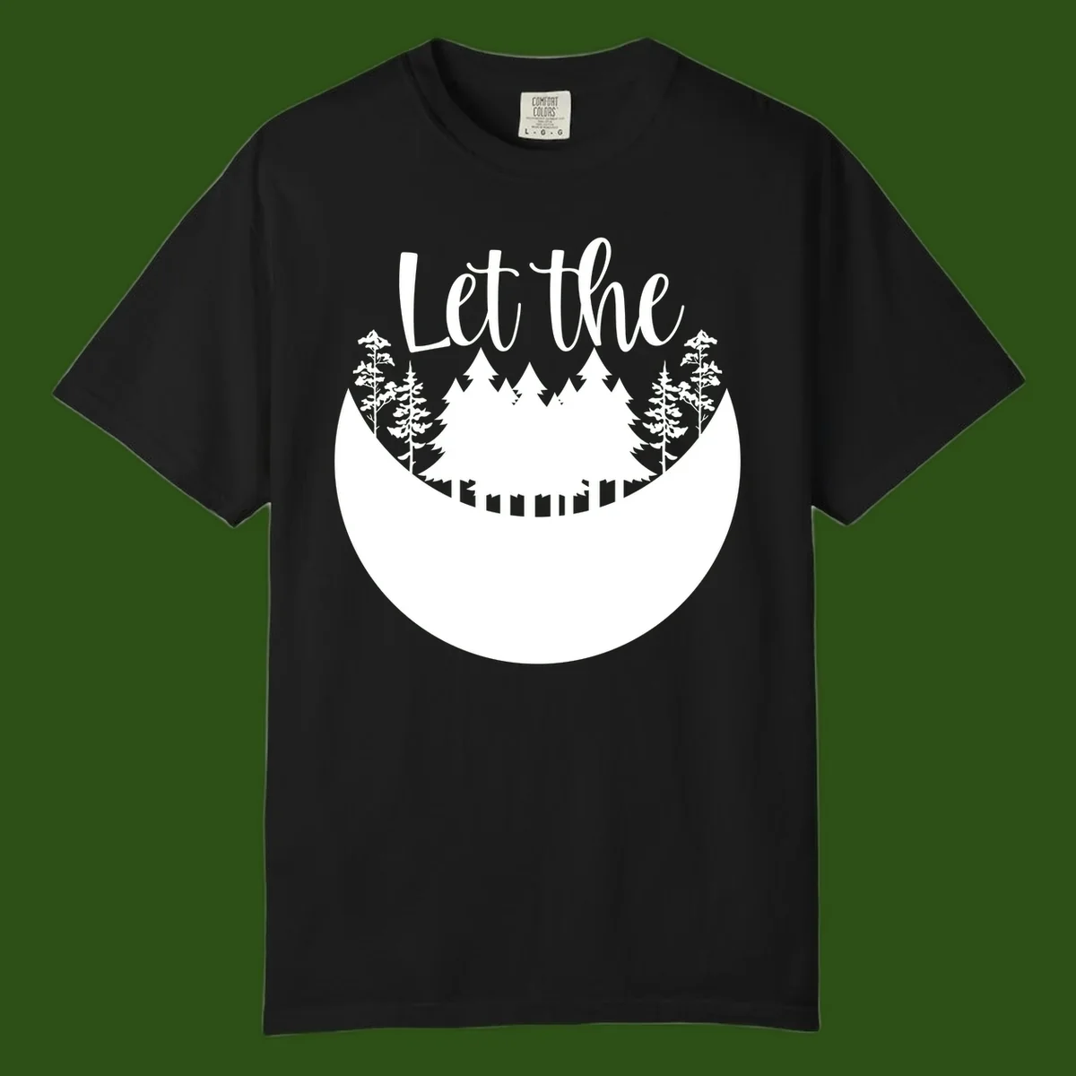 White silhouette of evergreen trees and mountain peaks arranged in a crescent moon shape with 'Let the' text above in script font on gray background.