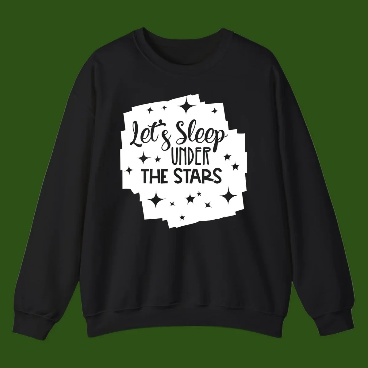 Whimsical design with 'Let's Sleep Under The Stars' text surrounded by sparkles and stars, evoking a cozy camping night.