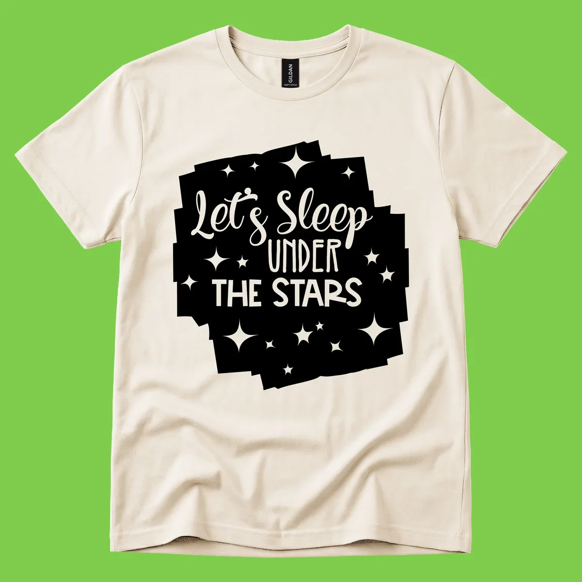 Whimsical design with 'Let's Sleep Under The Stars' text surrounded by sparkles and stars, evoking a cozy camping night.