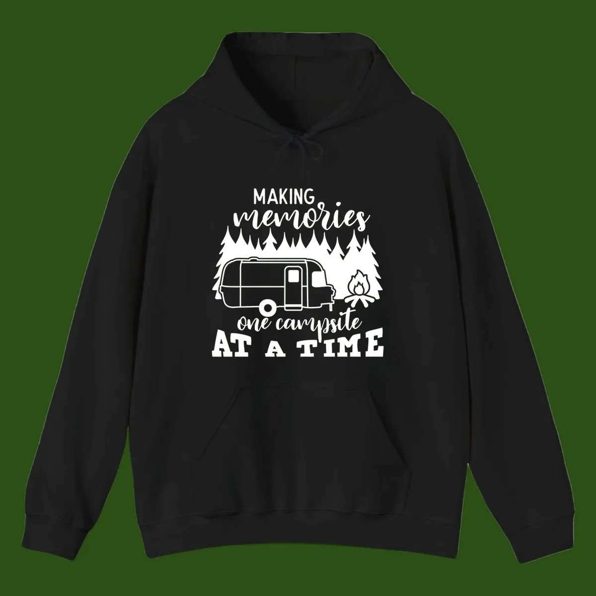 Vintage Airstream trailer parked among evergreen trees with a campfire, text reading Making Memories One Campsite At A Time