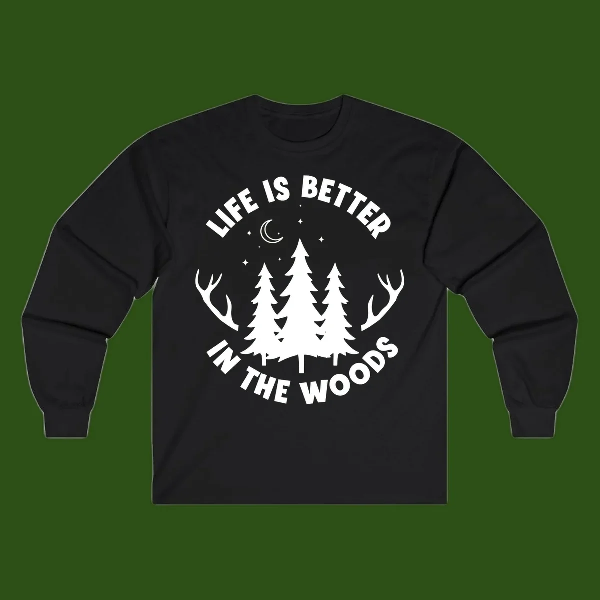 Life is better in the woods design with pine trees, deer antlers, moon and stars on gray background