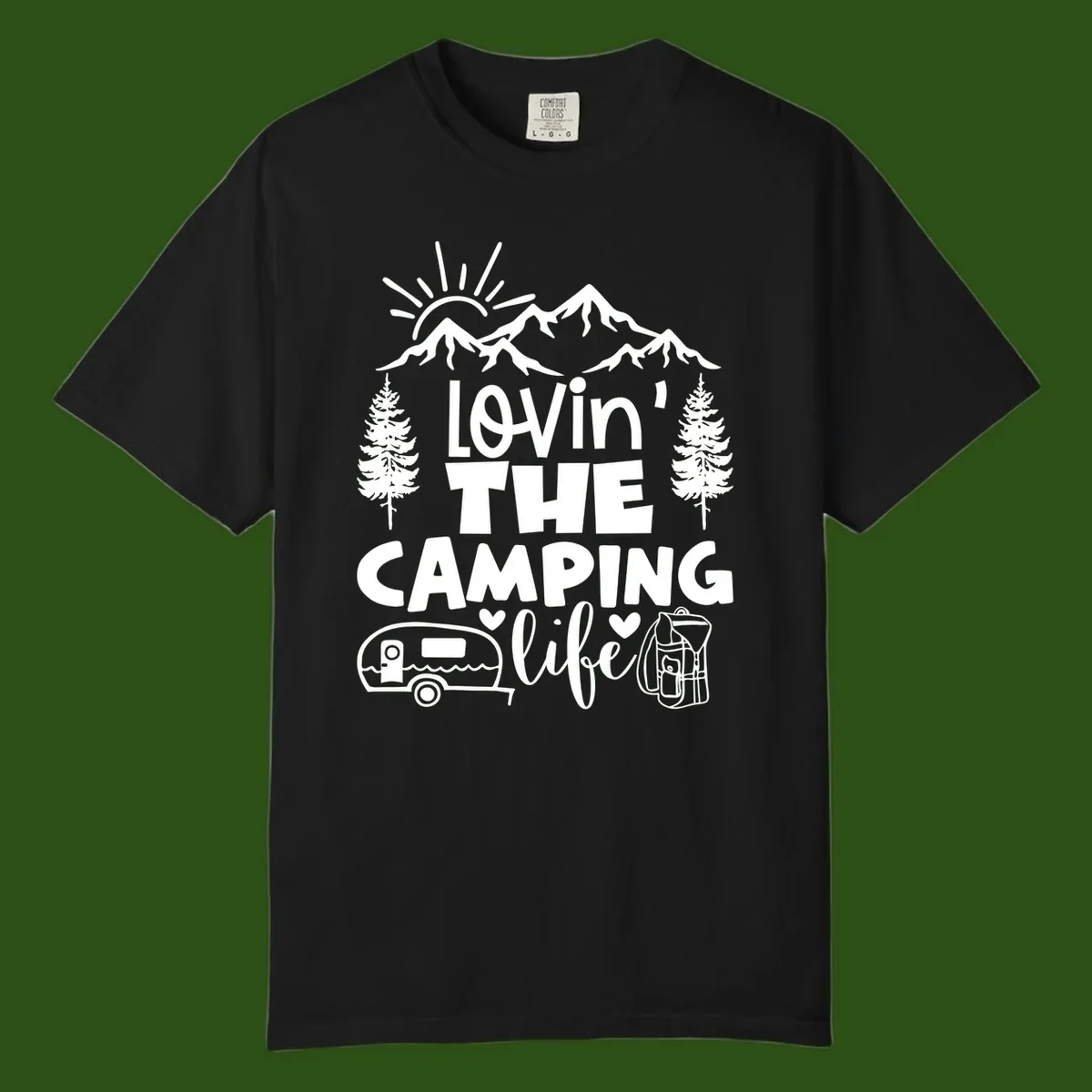 Lovin camping life design with mountains, sun, trees, RV and backpack on gray background