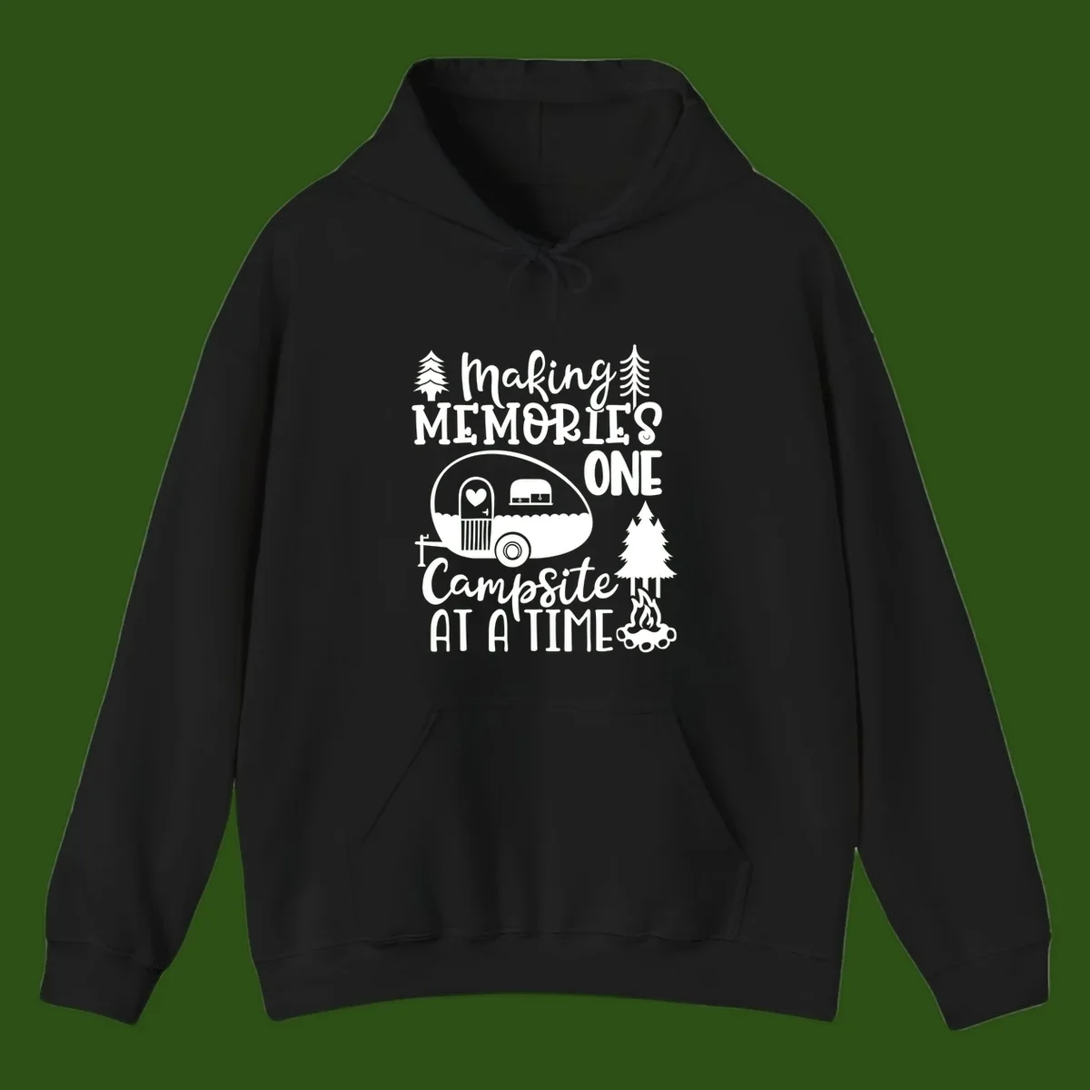 Vintage camper trailer surrounded by pine trees and campfire with 'Making Memories One Campsite At A Time' text
