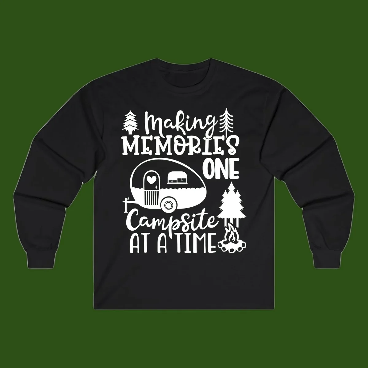 Vintage camper trailer surrounded by pine trees and campfire with 'Making Memories One Campsite At A Time' text