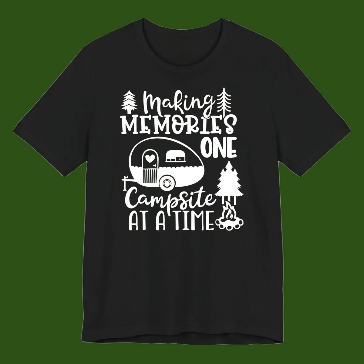 Vintage camper trailer surrounded by pine trees and campfire with 'Making Memories One Campsite At A Time' text