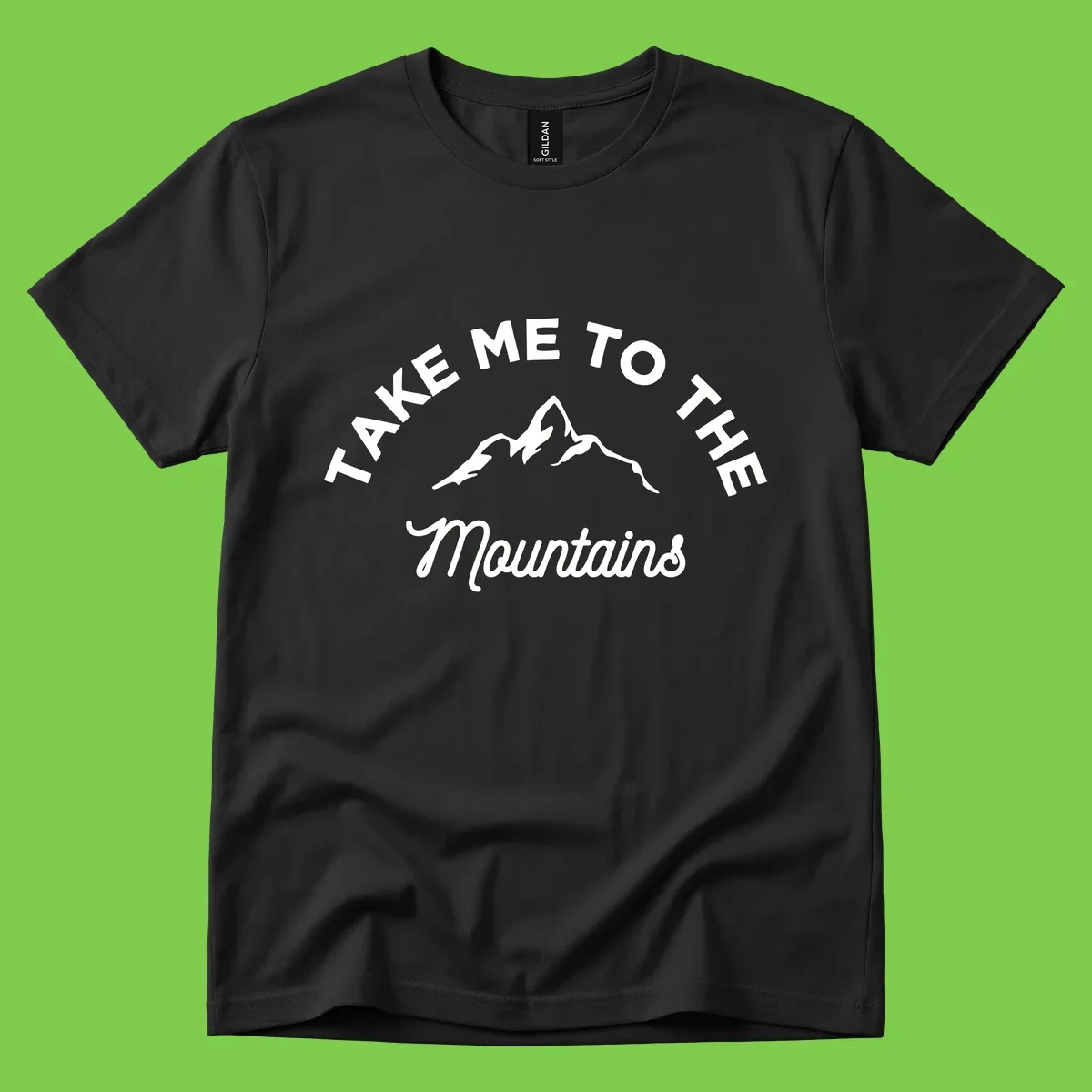 White mountain silhouette with curved text reading 'Take Me To The Mountains' on gray background