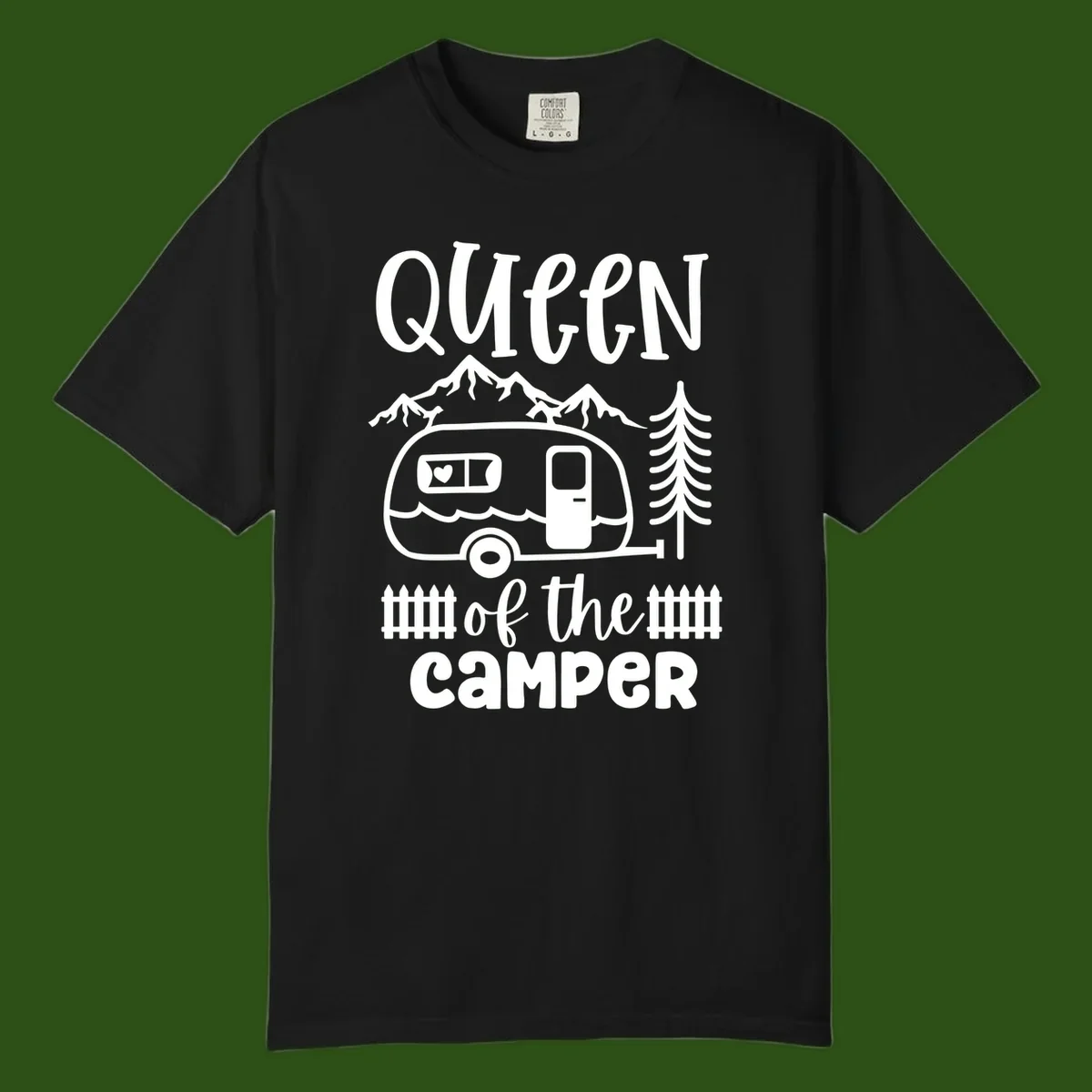 Queen of the Camper design featuring vintage trailer, mountains, and evergreen trees with bold text