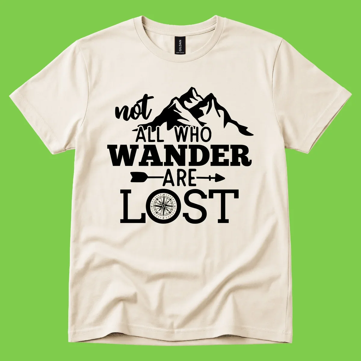 White mountain silhouette with compass rose and arrows, text reads 'not ALL WHO WANDER ARE LOST' on gray background