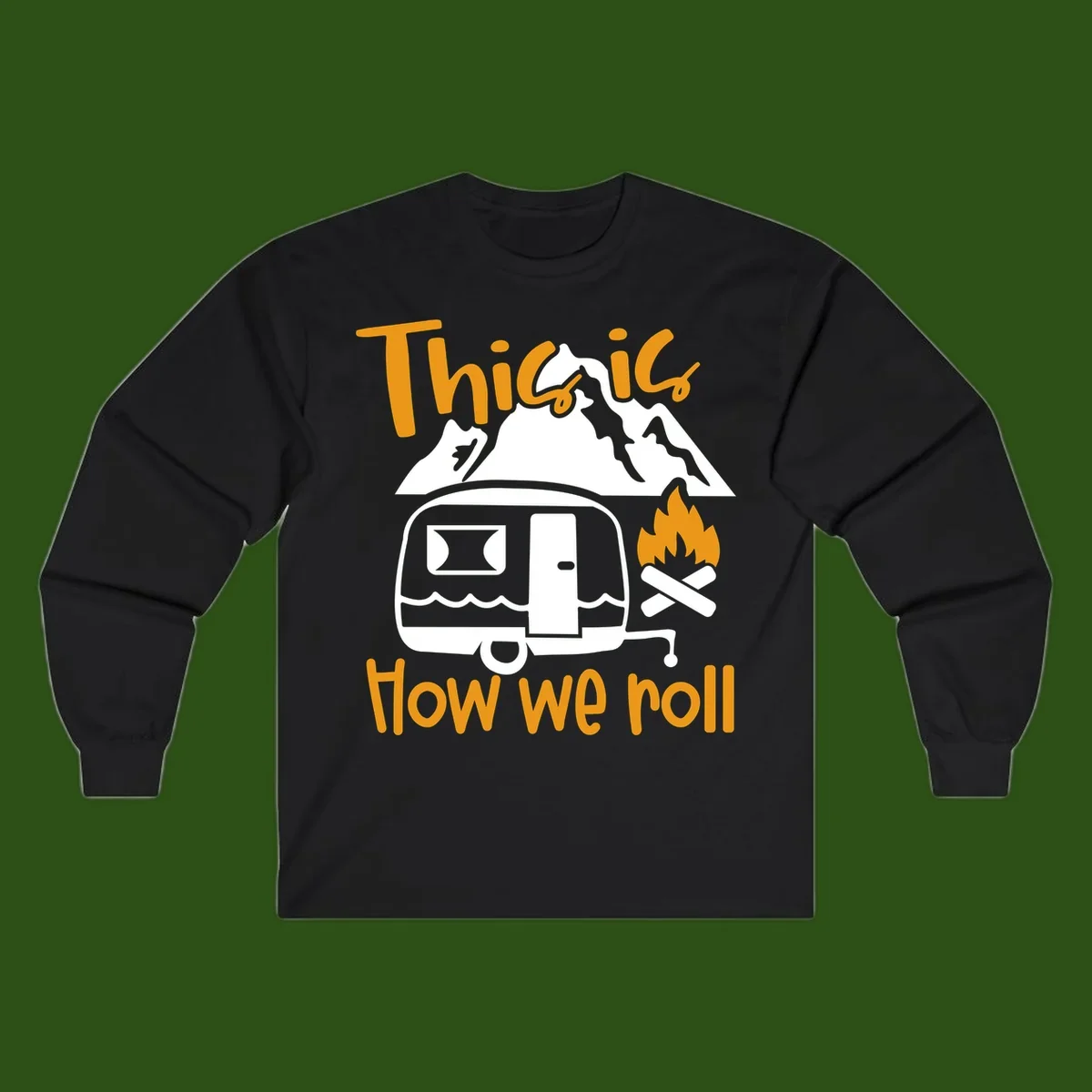 Vintage travel trailer with campfire and mountains, text reads 'This is how we roll' - camping lifestyle illustration