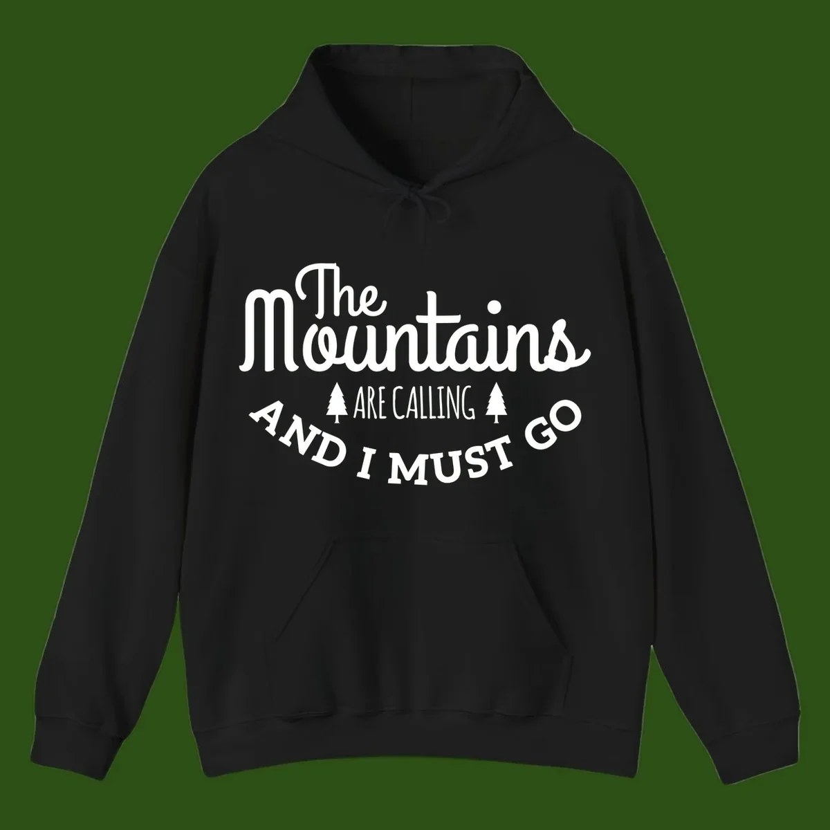 White text reading "The Mountains Are Calling And I Must Go" with pine trees on gray background