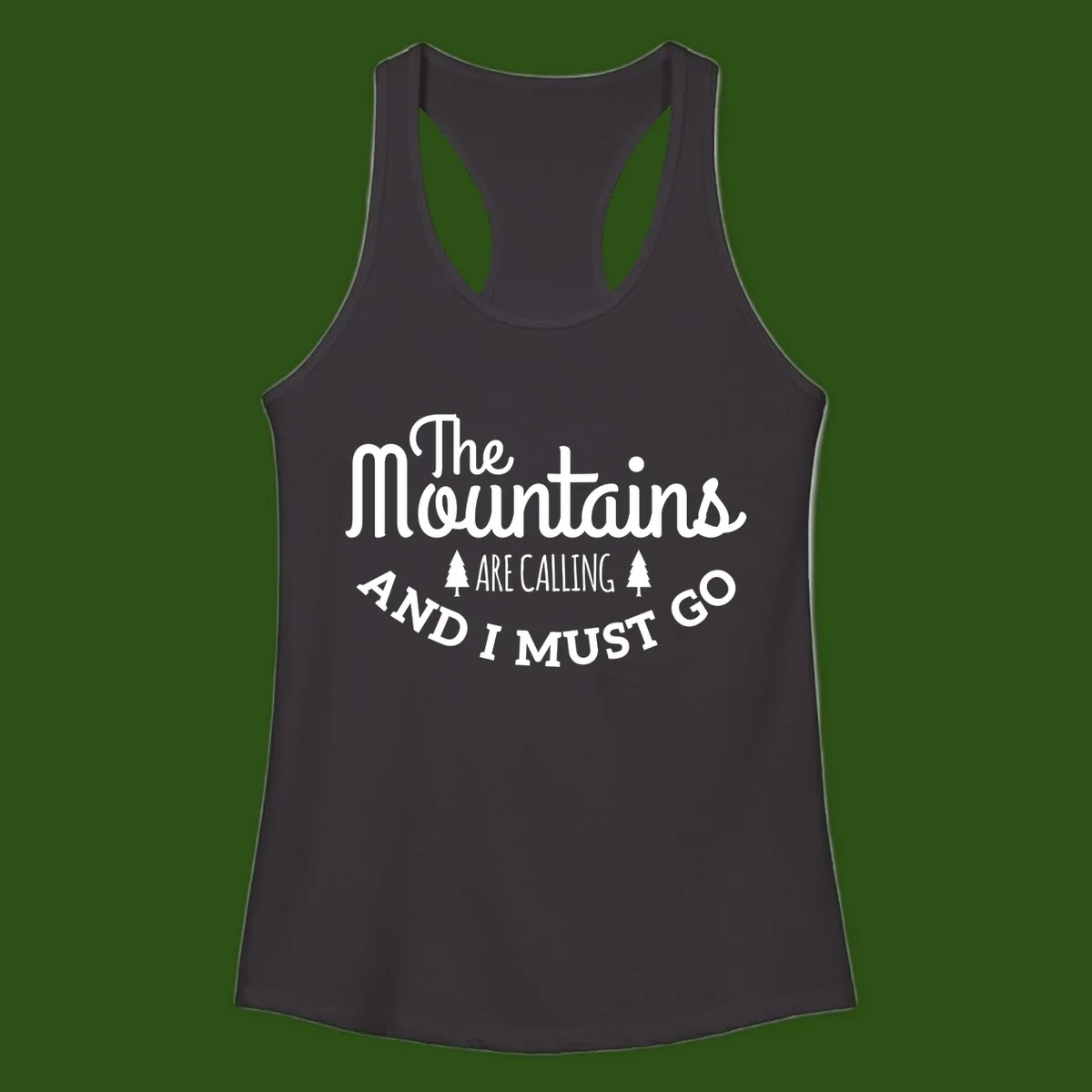 White text reading "The Mountains Are Calling And I Must Go" with pine trees on gray background