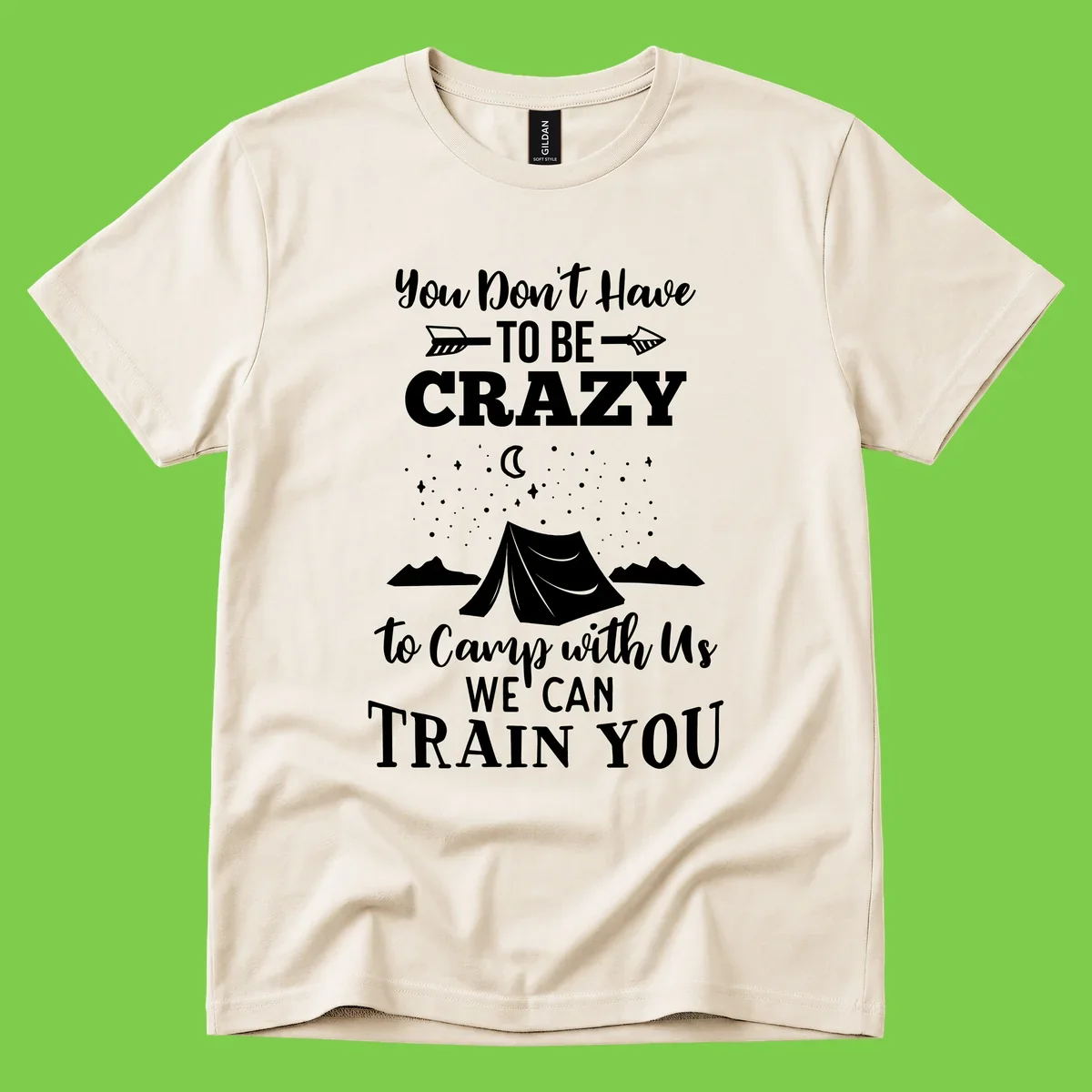 Gray design with white text reading 'You Don't Have To Be Crazy To Camp With Us We Can Train You' featuring a tent under stars and mountains