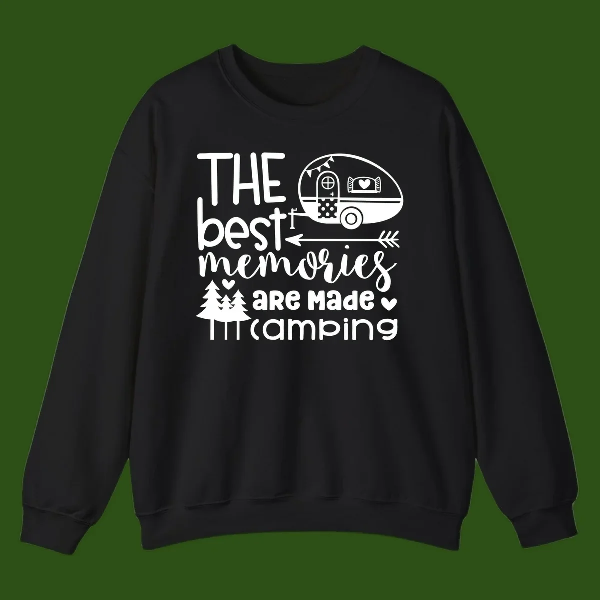 Vintage travel trailer with decorative text reading 'The best memories are made camping' surrounded by pine trees and hearts on gray background.