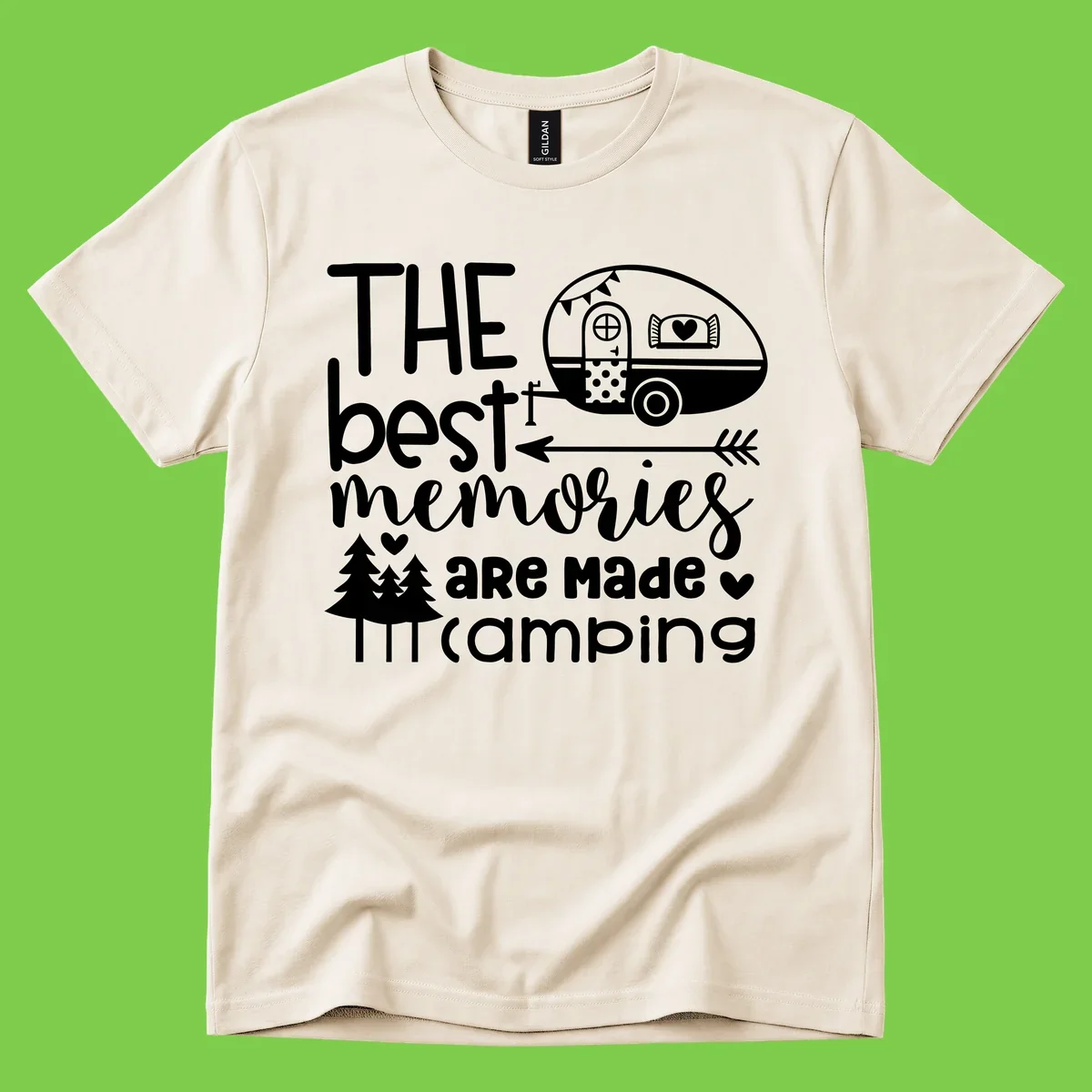 Vintage travel trailer with decorative text reading 'The best memories are made camping' surrounded by pine trees and hearts on gray background.