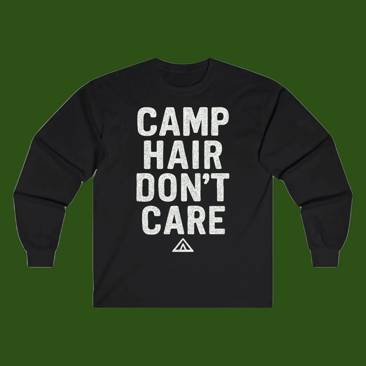 White speckled text reading 'Camp Hair Don't Care' with triangle symbol on gray background