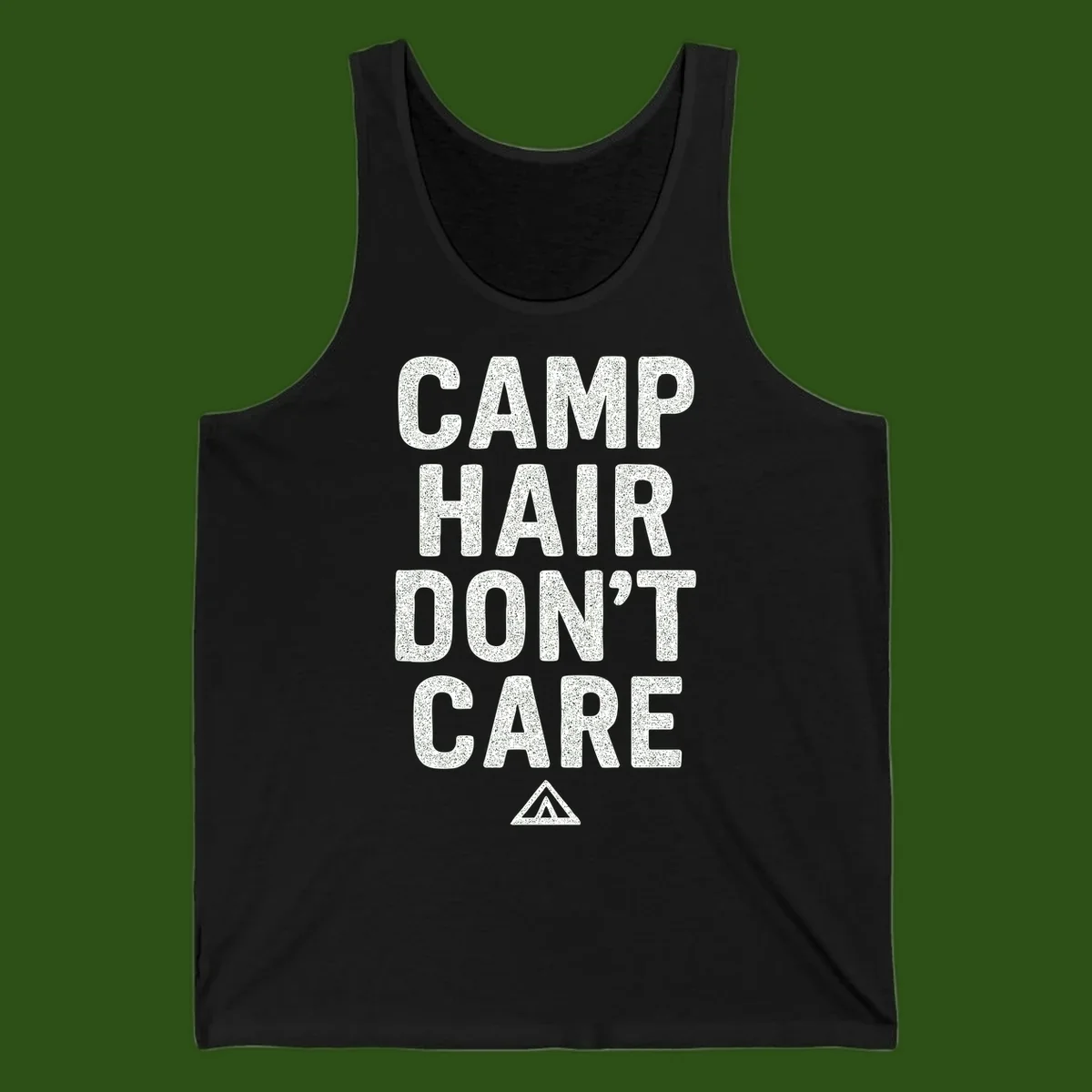 White speckled text reading 'Camp Hair Don't Care' with triangle symbol on gray background