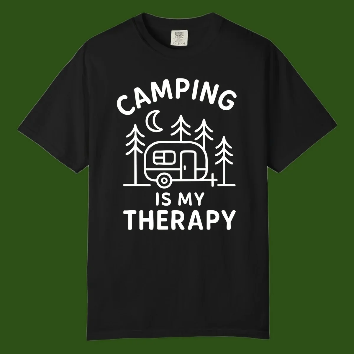 Camping therapy design with travel trailer, pine trees, and moon under text reading 'Camping Is My Therapy'