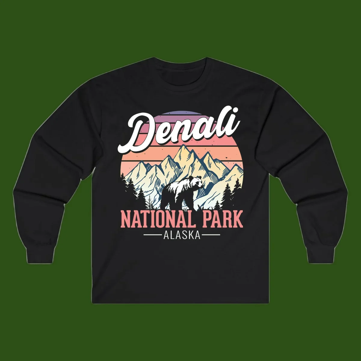 Vintage-style Denali National Park illustration featuring a bear in snowy mountains with retro sunset stripes and evergreen trees
