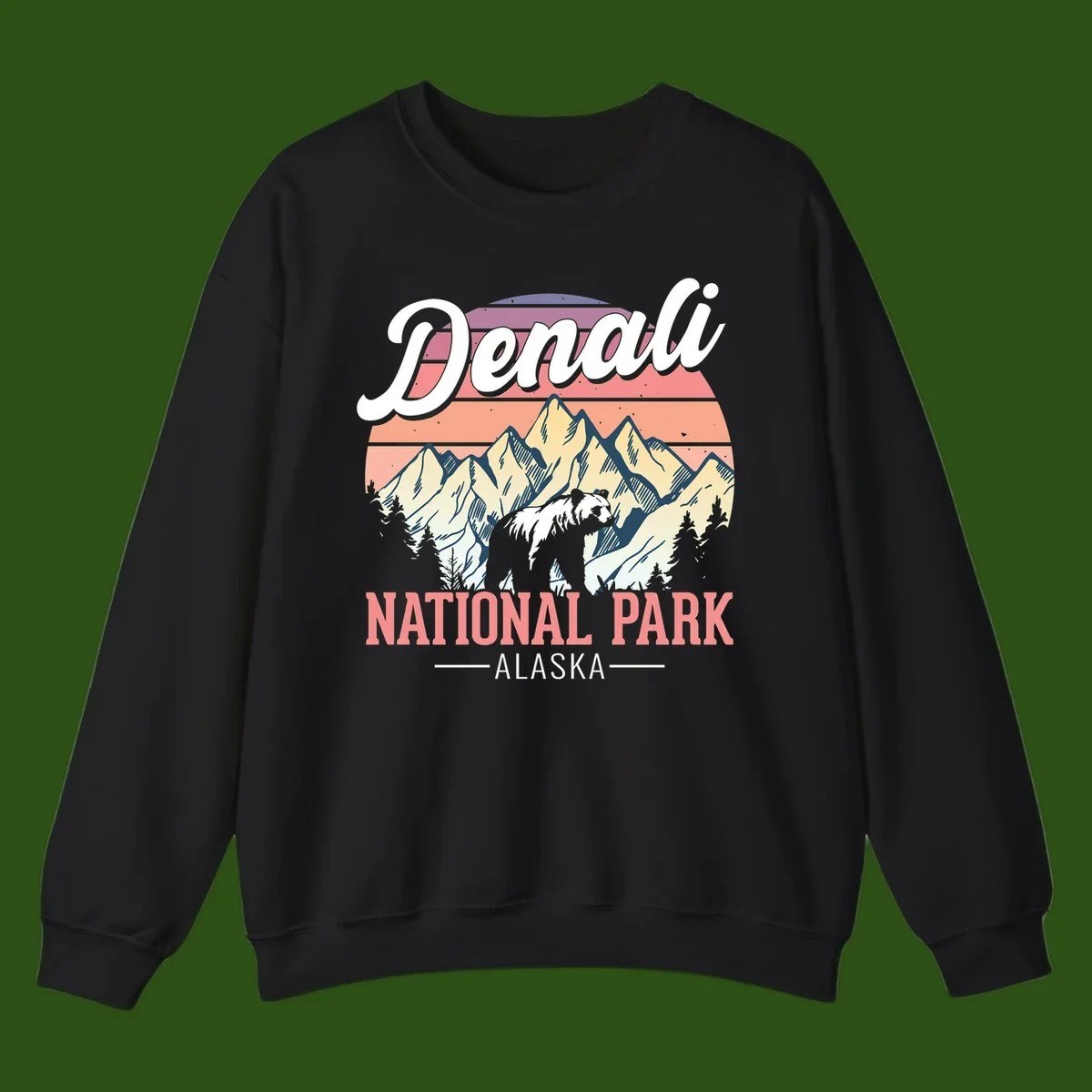 Vintage-style Denali National Park illustration featuring a bear in snowy mountains with retro sunset stripes and evergreen trees