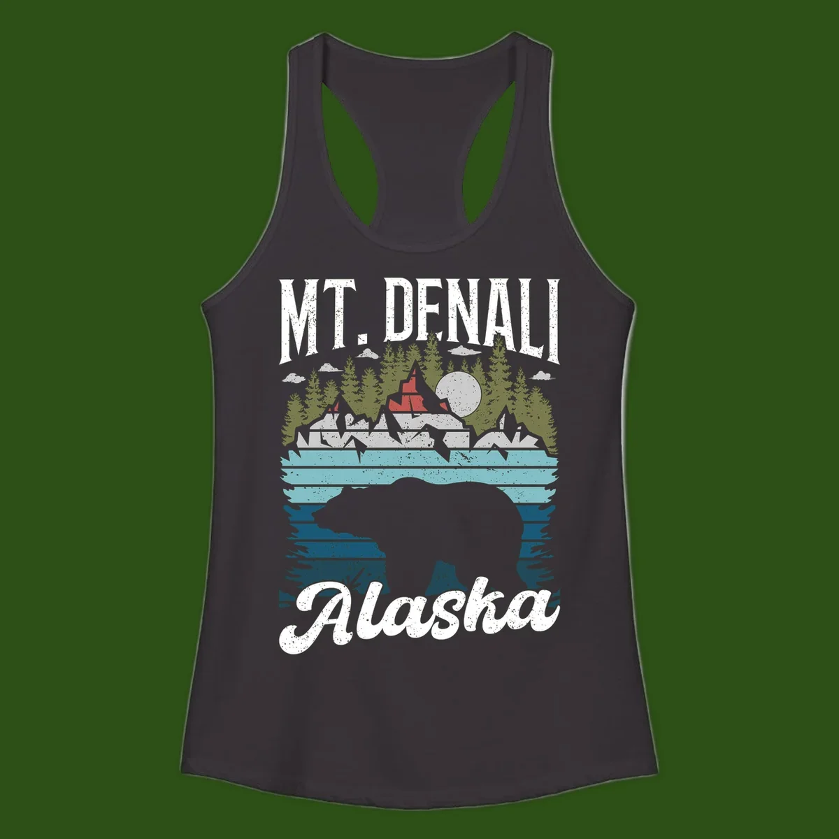 Denali bear Alaska design: layered illustration with silhouetted bear emerging from water, mountain peaks, fortress, forest, and full moon.