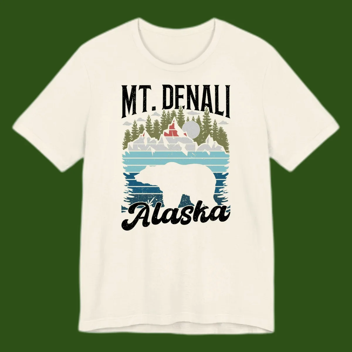 Denali bear Alaska design: layered illustration with silhouetted bear emerging from water, mountain peaks, fortress, forest, and full moon.