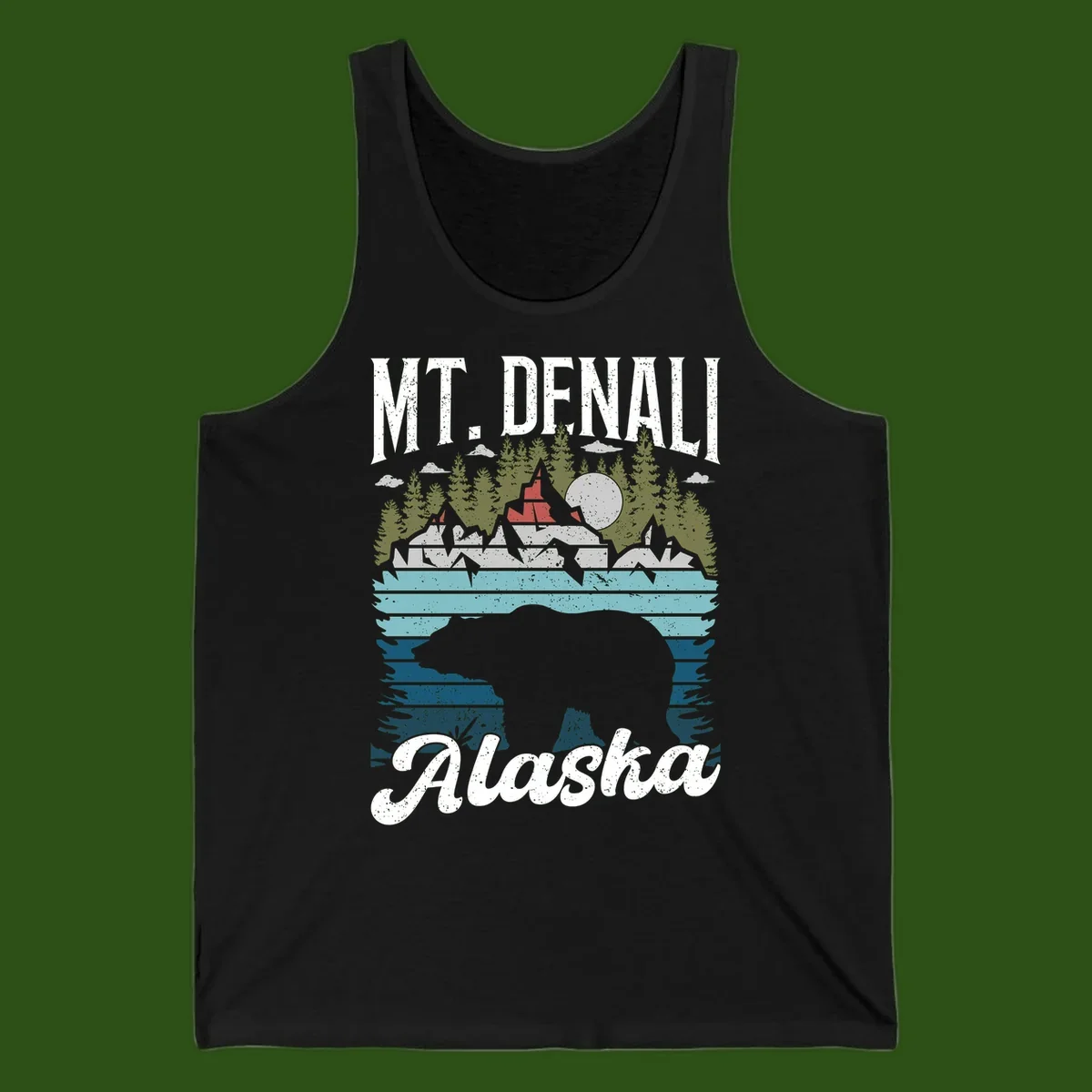 Denali bear Alaska design: layered illustration with silhouetted bear emerging from water, mountain peaks, fortress, forest, and full moon.