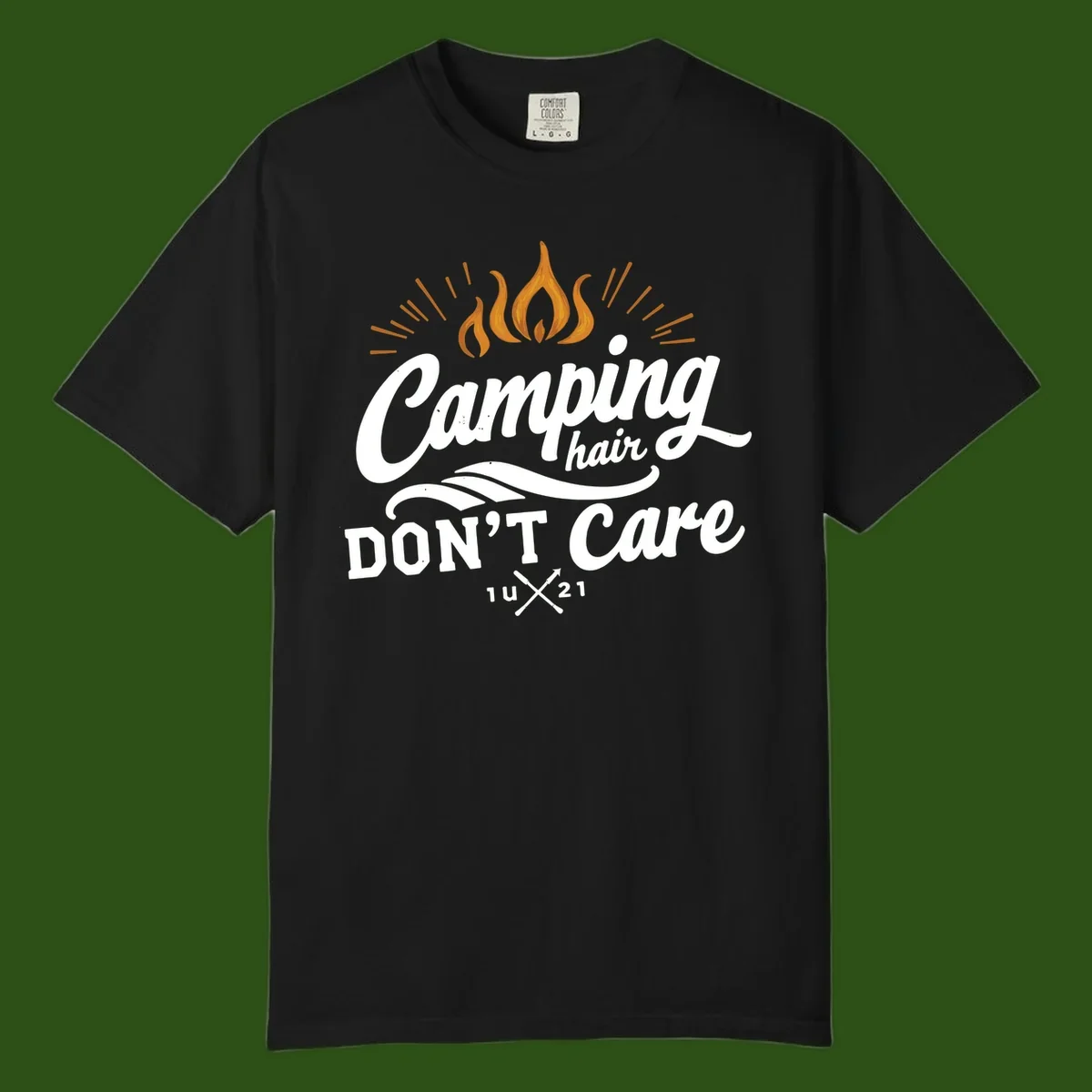 Camping hair don't care design with orange flame and radiating light rays in white lettering on gray background