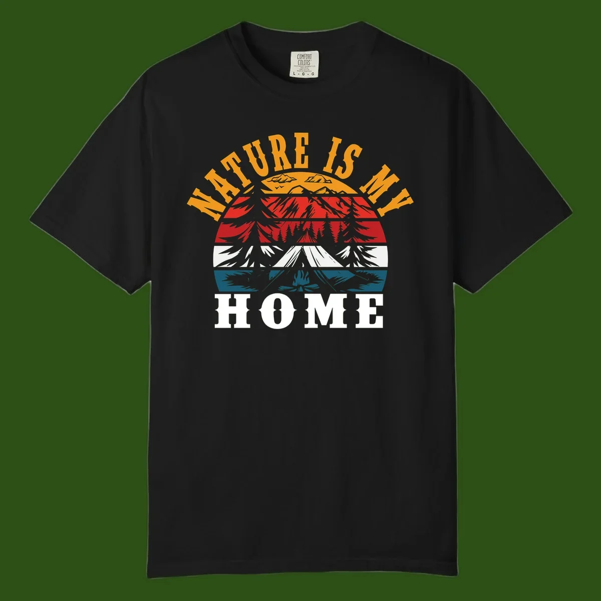 Nature Is Home mountain camping graphic with layered landscape, campfire, forest, and golden sun rays text design