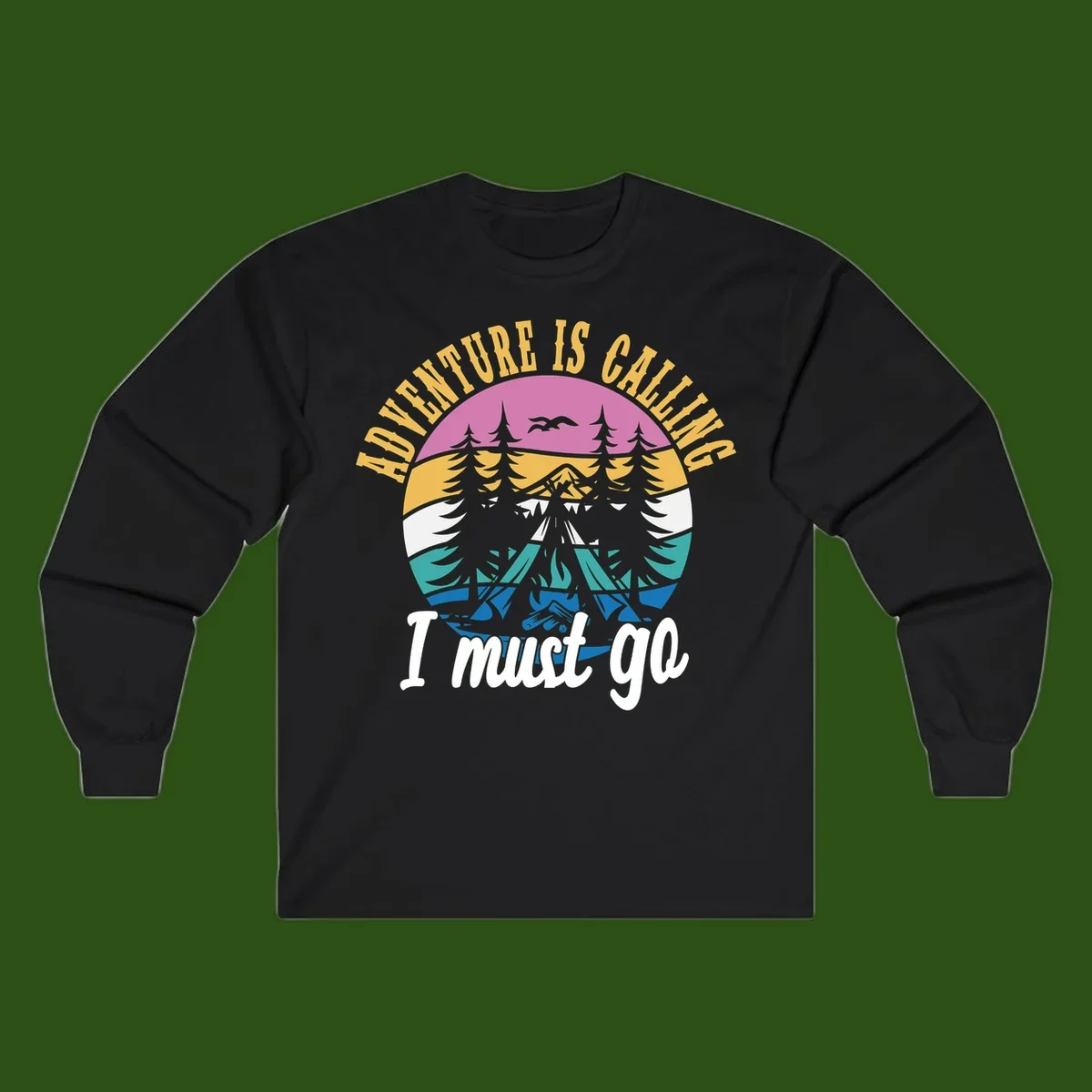 Circular badge with mountain landscape, evergreen trees, and flying birds in pink, gold, white, teal and blue with text 'Adventure Is Calling I Must Go'