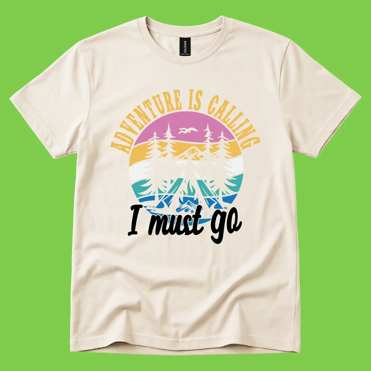 Circular badge with mountain landscape, evergreen trees, and flying birds in pink, gold, white, teal and blue with text 'Adventure Is Calling I Must Go'