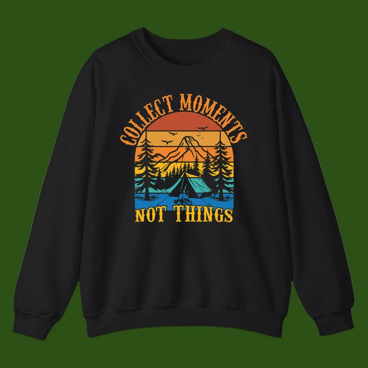 Retro layered landscape showing sunset, mountains, forest, tent and campfire with 'Quiet Mornings Not Things' text