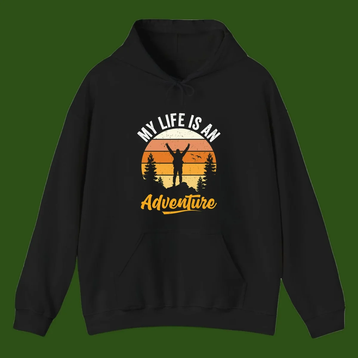 Retro sunset illustration with silhouette of person celebrating arms raised, evergreen trees and mountains, text 'My Life Is An Adventure'