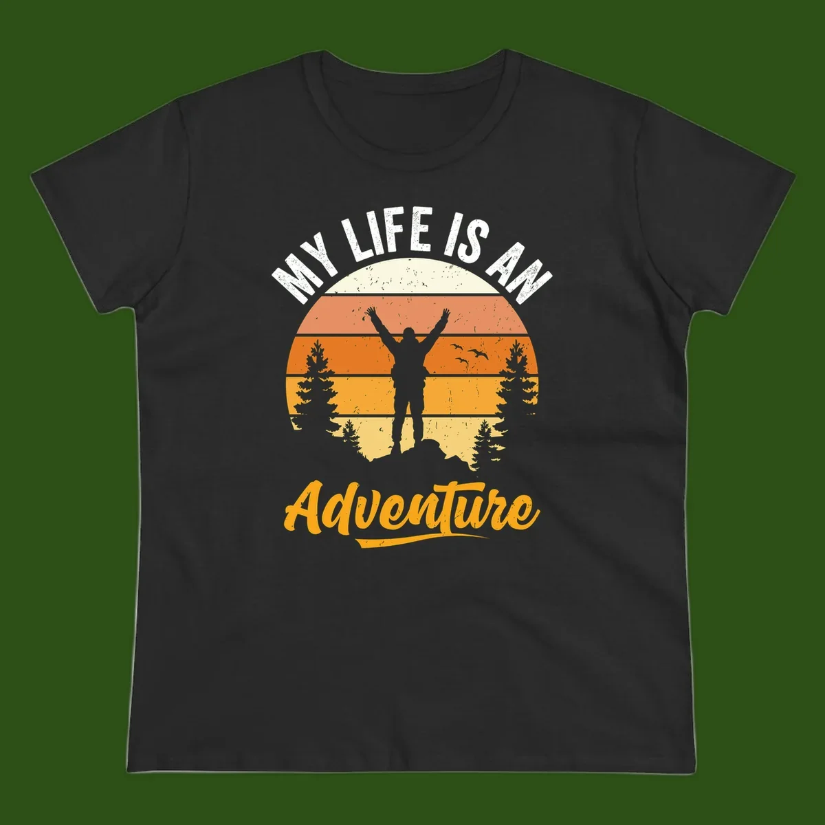 Retro sunset illustration with silhouette of person celebrating arms raised, evergreen trees and mountains, text 'My Life Is An Adventure'