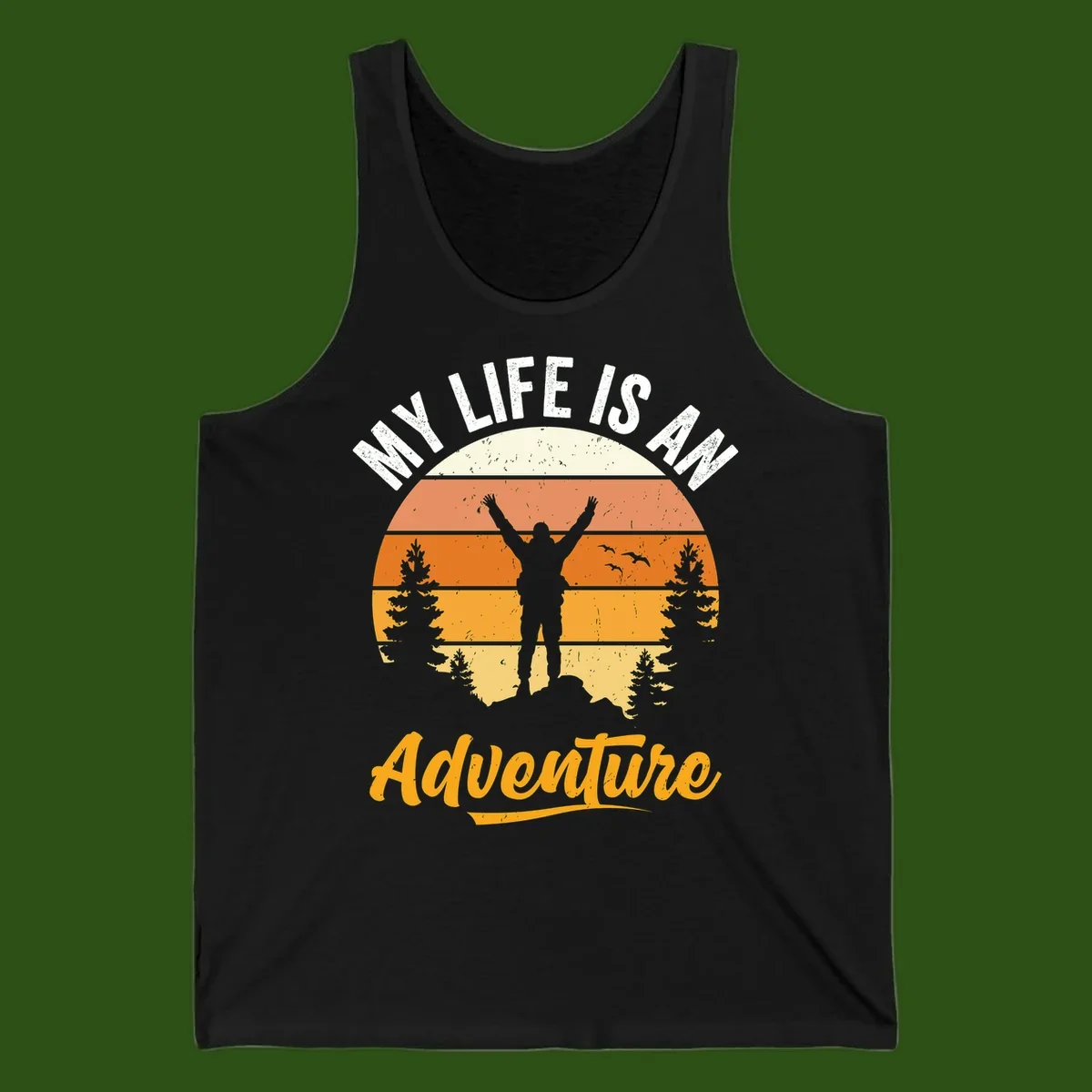 Retro sunset illustration with silhouette of person celebrating arms raised, evergreen trees and mountains, text 'My Life Is An Adventure'