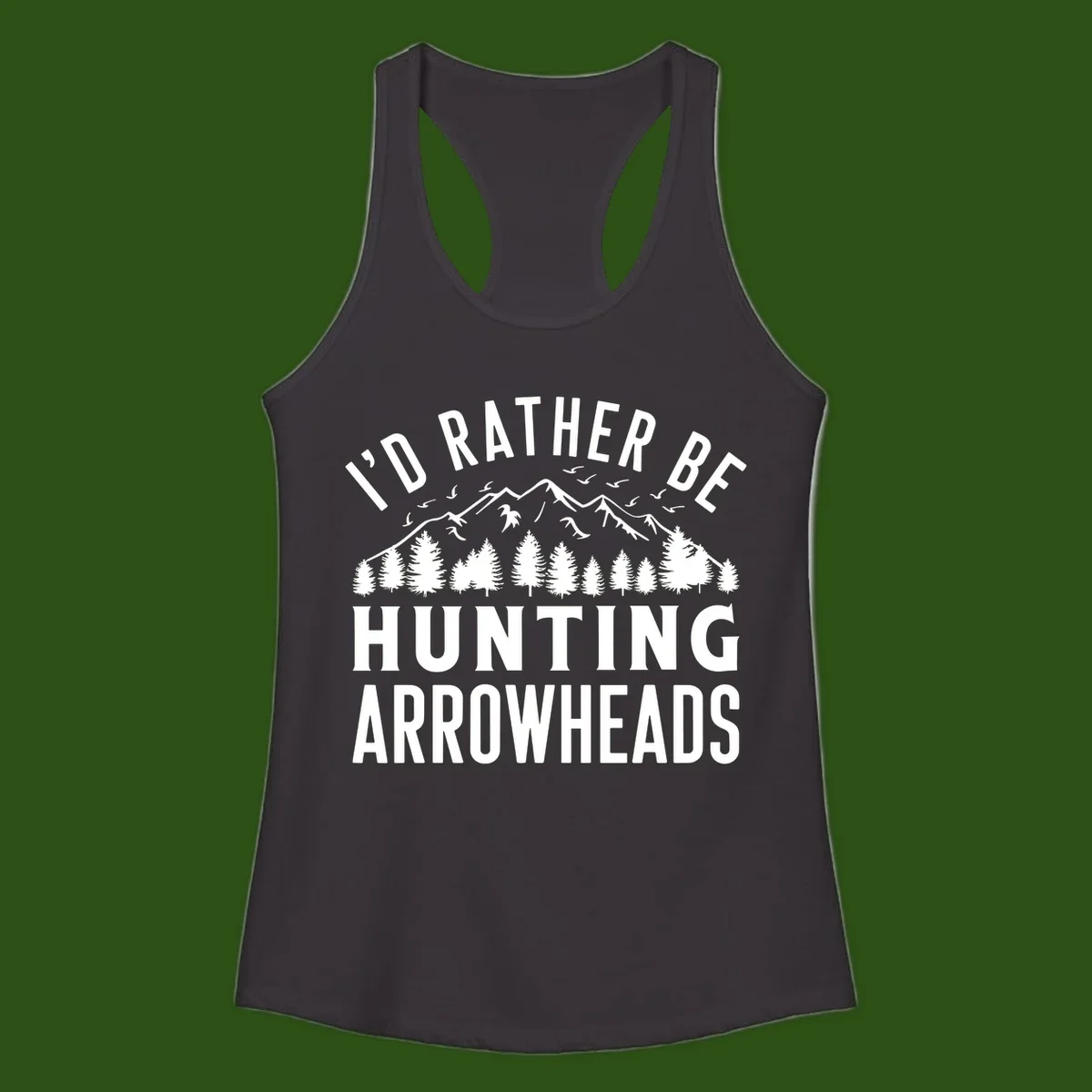 Mountain landscape with evergreen trees and birds, white text reading 'I'd Rather Be Hunting Arrowheads' on gray background