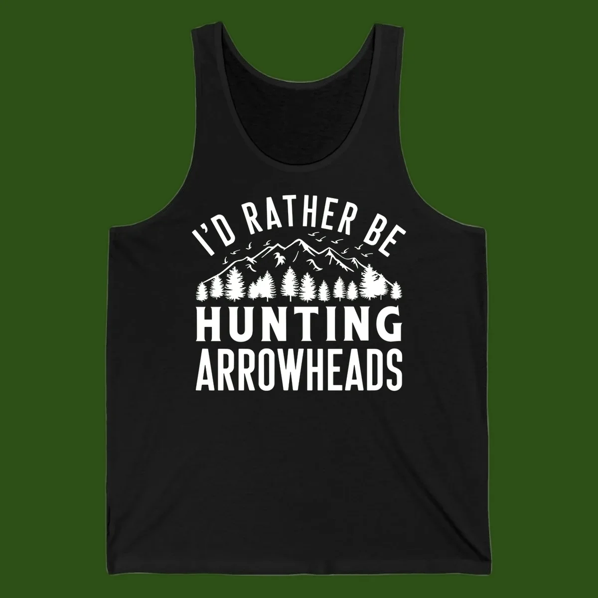 Mountain landscape with evergreen trees and birds, white text reading 'I'd Rather Be Hunting Arrowheads' on gray background