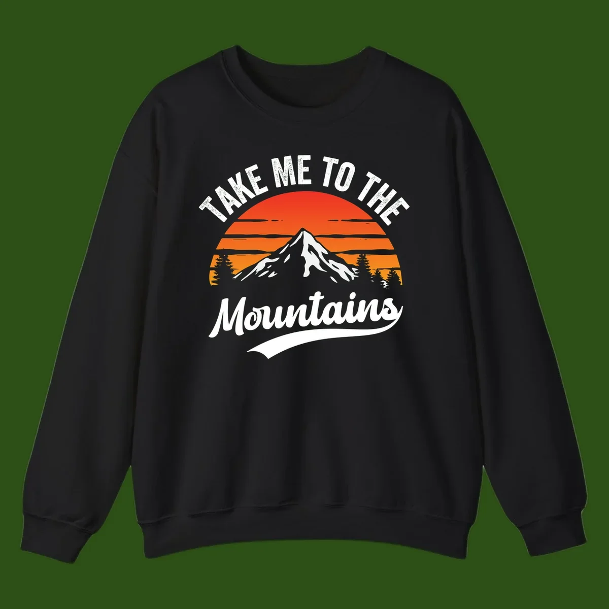 Vintage-style illustration of snow-capped mountain with sunset stripes and evergreen trees, text reading 'Take Me To The Mountains'
