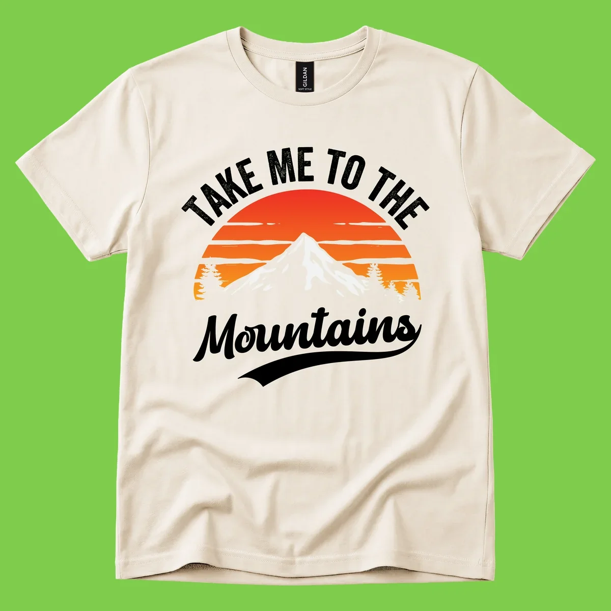 Vintage-style illustration of snow-capped mountain with sunset stripes and evergreen trees, text reading 'Take Me To The Mountains'