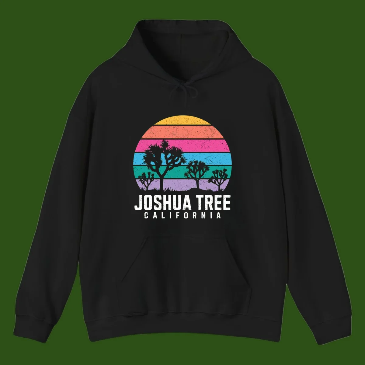 Joshua tree desert stripes design with silhouetted trees across rainbow horizontal color bands and distressed texture.