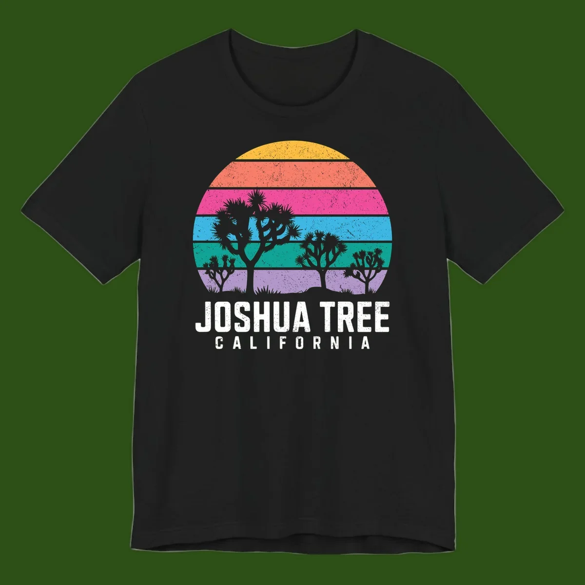 Joshua tree desert stripes design with silhouetted trees across rainbow horizontal color bands and distressed texture.