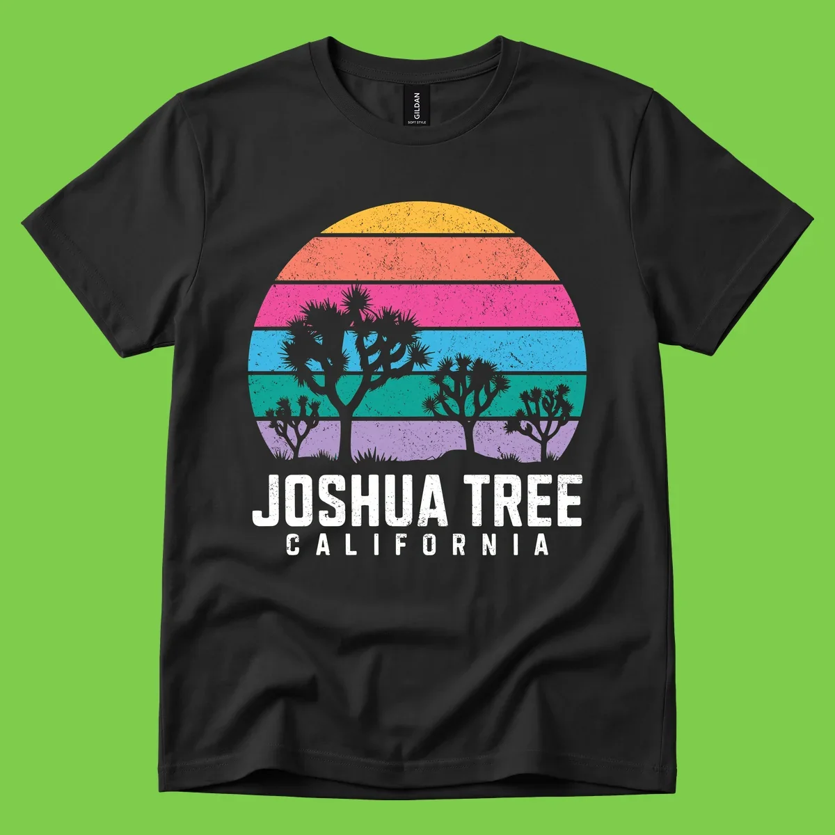 Joshua tree desert stripes design with silhouetted trees across rainbow horizontal color bands and distressed texture.