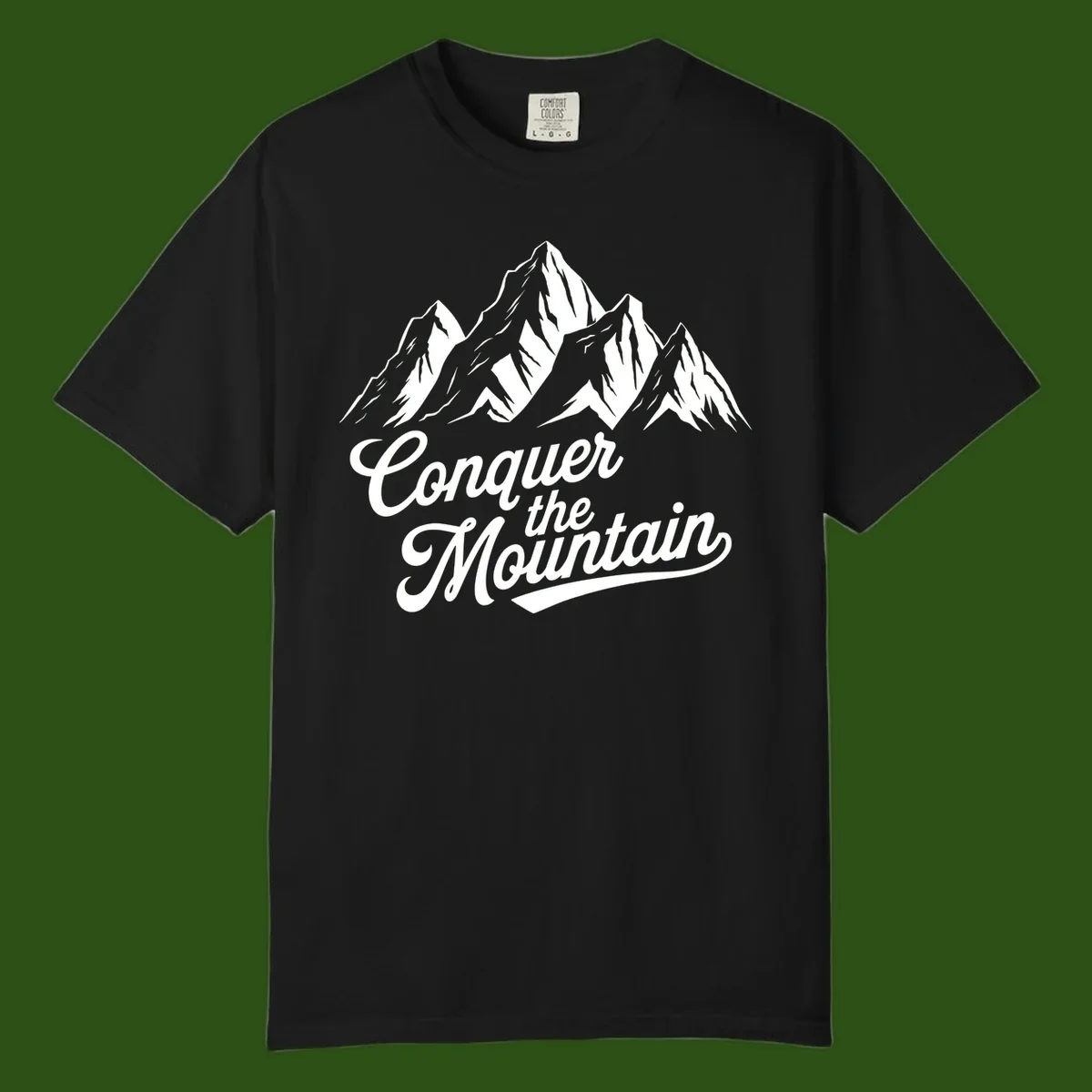Vintage-style illustration of snow-capped mountain peaks with 'Conquer the Mountain' text in cursive script