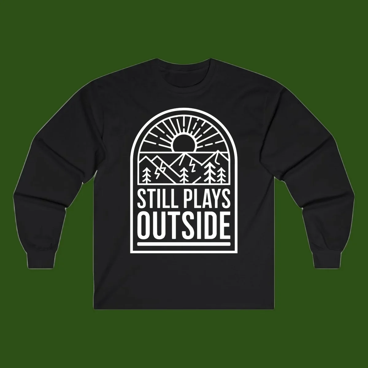 Still Plays Outside badge design featuring mountains, sun, pine trees, and lightning bolt in minimalist line art style