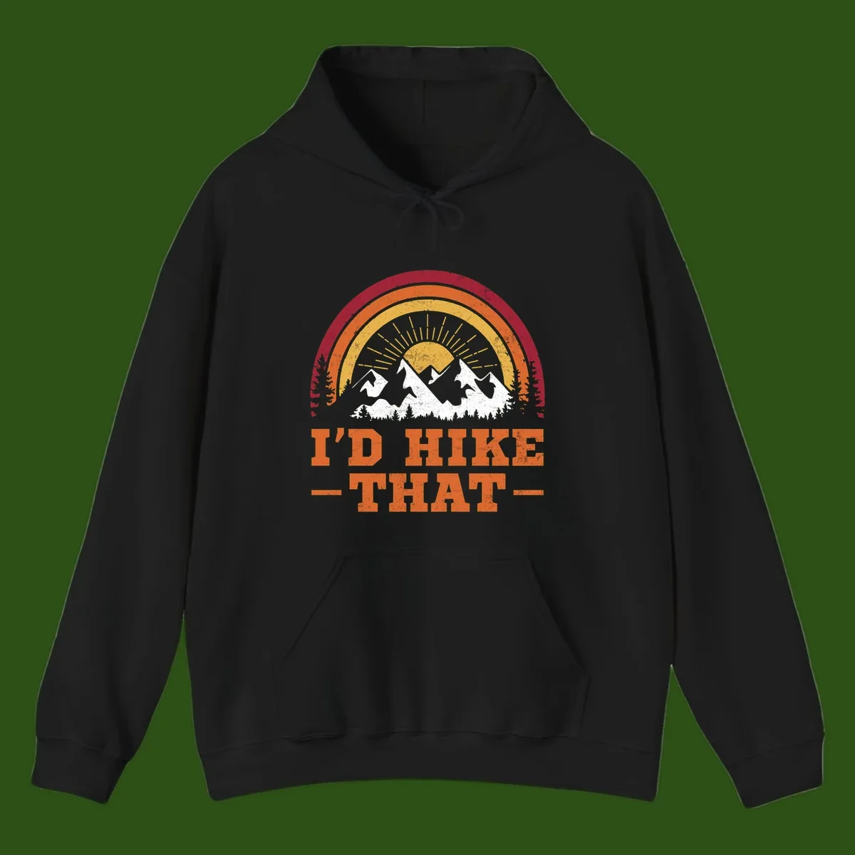 Vintage badge design with snow-capped mountains, evergreen trees, golden sun rays, and text reading 'I'd Hike That' in retro style